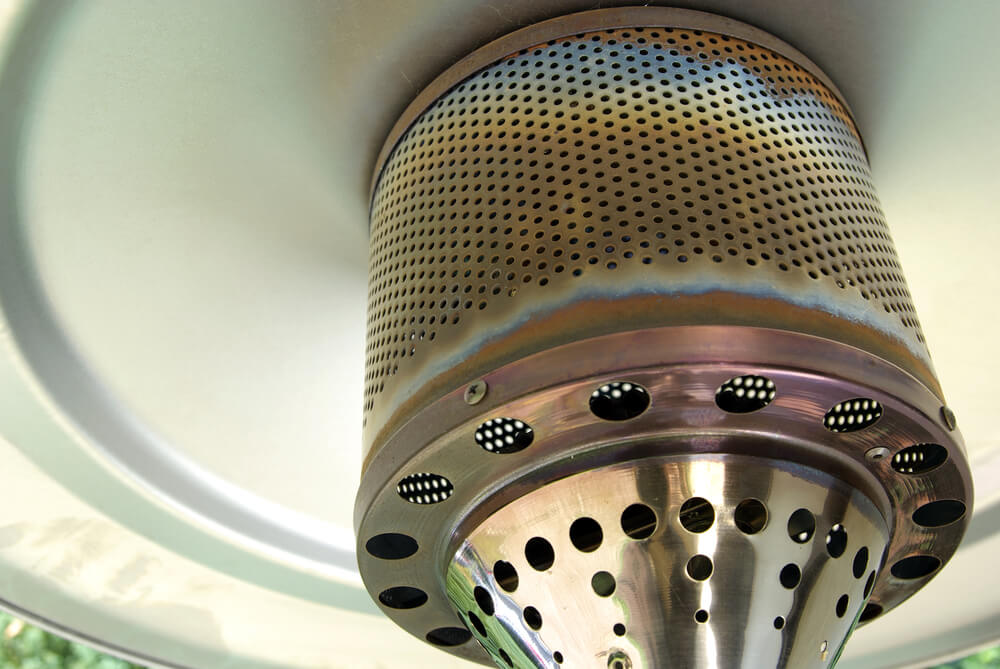 Stand-up outdoor patio heater gas burner view